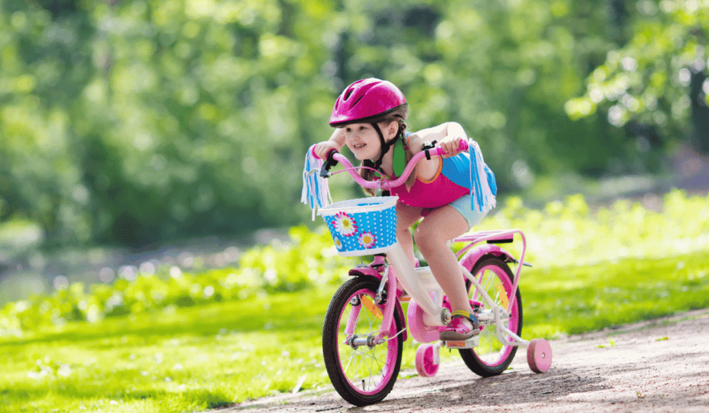 Girl riding a bike. 