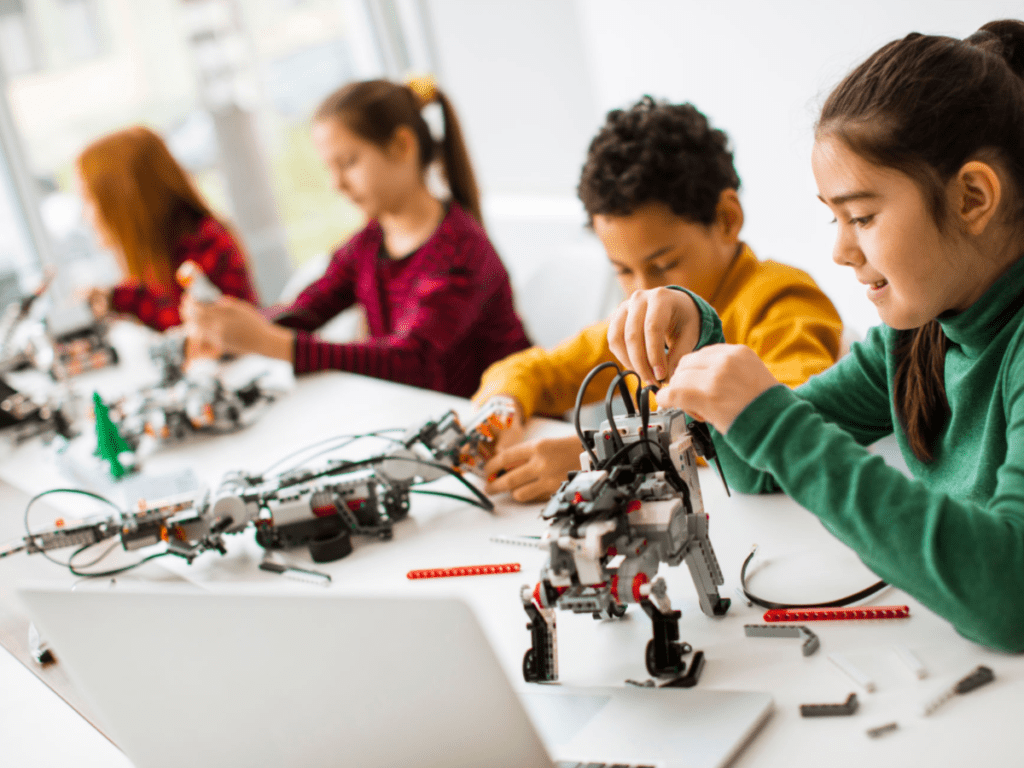 Kids working on robots.
