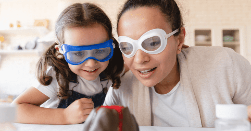 Mom and daughter doing a stem volcano.