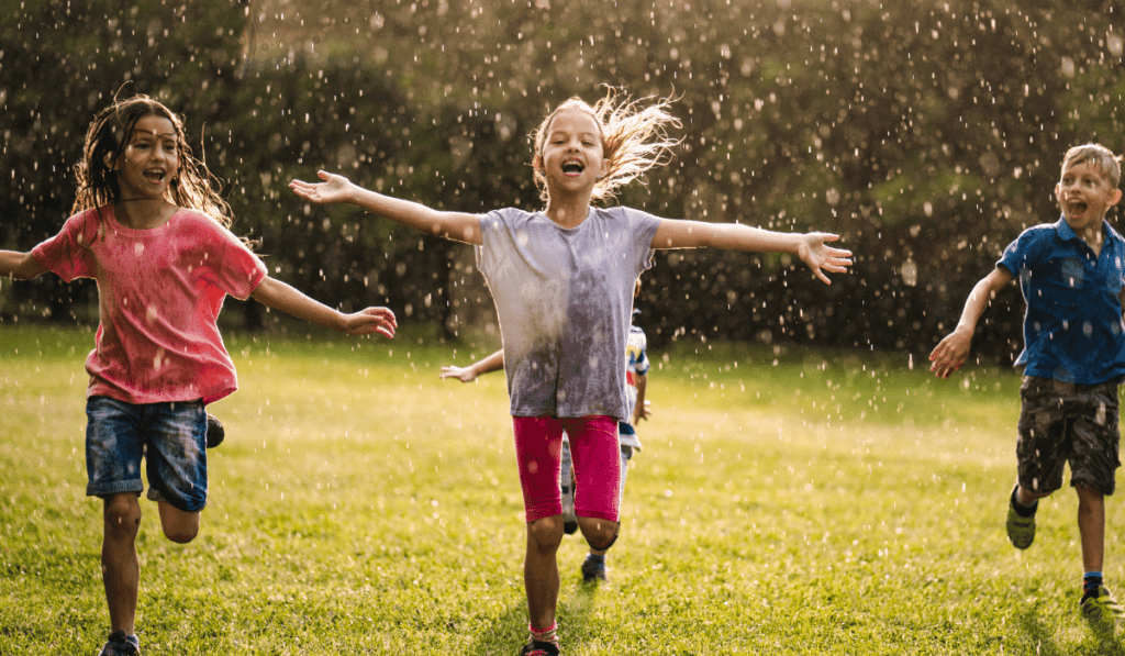 kids running in the rain. 