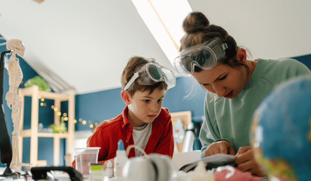 Mother and son working together on a science experiment. 